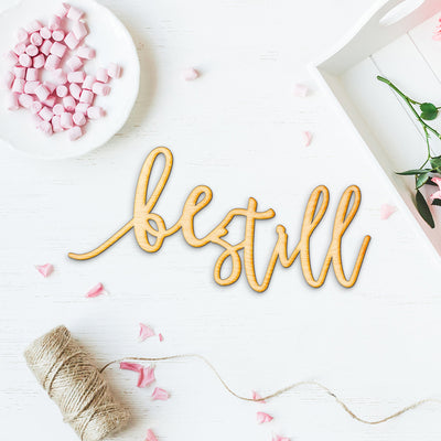Pen Script Be Still Wood Sign