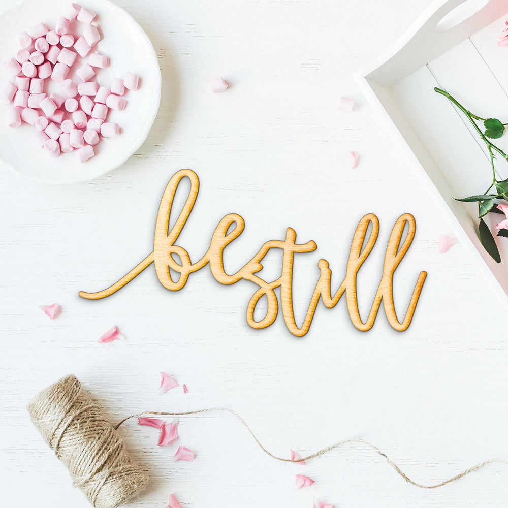 Pen Script Be Still Wood Sign